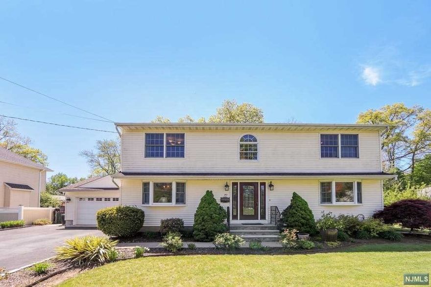 Welcome to this incredible 4 bedroom expanded ranch house (2,400 sq ft) with an amazing backyard in a quiet neighborhood of Parsippany. Step into the entry foyer greeted by the grandeur of the chandelier where on the FIRST FLOOR, you can find a sun filled living room, formal dining room, a eat-in country kitchen, a bedroom, full bathroom and a linen closet. From the kitchen, you'll find the gorgeous sunroom (done in 2016) that opens to the perfectly maintained backyard through a sliding door. The SECOND FLOOR features the main bedroom with a full bath with a jetted tub, 2 more bedrooms and another full bath. FINISHED LOWER LEVEL offers plenty of recreational space and utility room. Only 10 minute walk to Lake Parsippany, major highways (287, 80, 10) and local restaurants.