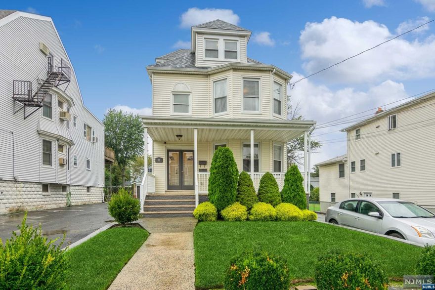 Magnificent 2 Family in Desirable Location! Property boasts an oversized lot, 2 car wide driveway allowing parking for up to 8 cars. Unit #1 located on the first level offers two bedrooms, updated bath, spacious LR, formal DR, updated kitchen with granite countertop & stainless appliances, beautiful wood floors, custom trim work throughout, high ceilings, laundry room & rear access to the wonderful backyard. Unit #2 offers two bedrooms, updated bath, spacious LR, formal DR, updated eat-in kitchen with granite countertop, office, beautiful wood floors, custom trim work throughout & high ceilings. Unit features two staircases which provide access to the huge, finished 3rd level that offers ample storage, open area & 3 additional rooms also to the large open basement with laundry area & wonderful rear yard. Units have separate electrical & gas meters, furnaces & water heaters. Only minutes to NJ Transit buses, Harrison PATH, major highways, restaurants, shops, schools & parks!