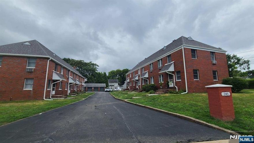 Location Location Location! First time on the market in over 70 years. Two well-maintained brick buildings with a total of eight townhome style - two floor apartments, 5 car garage, on over half an acre. Seven of the units are approximately 1088sq.ft with 2bd/1bath. There is one 3bd/1.5bath approximate ~1245 sq.ft. Location and layout makes the property ideal for a conversion to townhomes. Ez-Commute to NYC