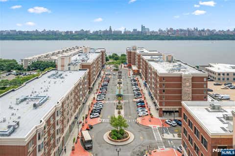Photo of 3411 City Pl, Edgewater, NJ 07020 (MLS # 26027115)