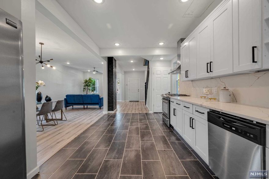 Can you image finally being in your brand new luxury Home for the Holidays? If you can, you'll be giving thanks in this spectacularly finished floor to ceiling fully renovated modern home. Nothing has been left untouched. In addition to the remarkably tasteful finishes, you will bring in the New Year with a NEW roof over your head (pun intended), all new plumbing, new electric and HVAC to boot. In this low inventory market, homes like this one that have been renovated down to the beams are an even rarer commodity. Put it on top of your list! MUST SEE!