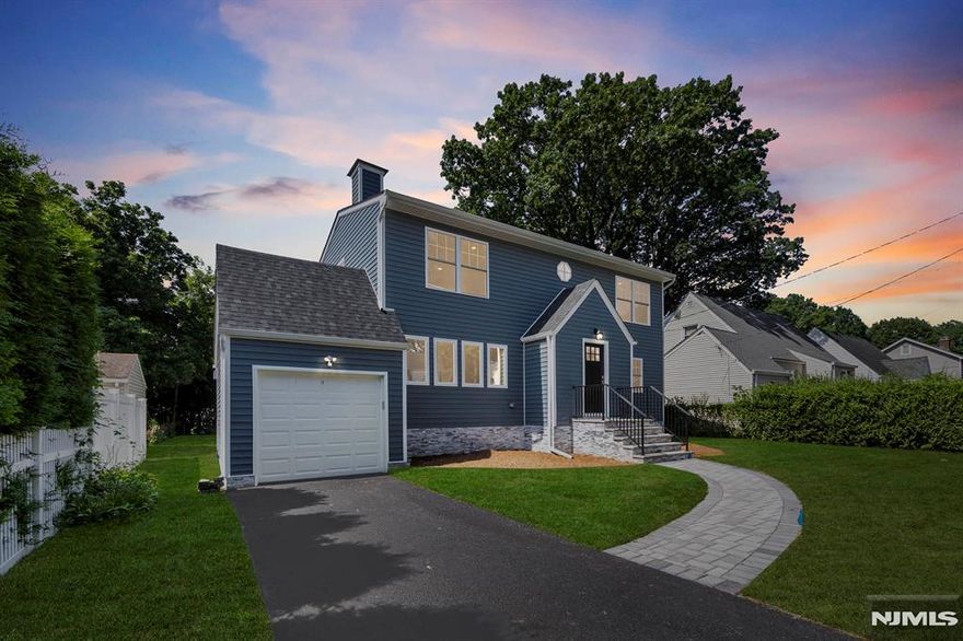 Watch the virtual tour video + see floor plans and 3D model at https://www.njproper.com/mls-296-pine Fully renovated and thoughtfully expanded, this 5-bed, 3.5-bath home blends modern style with peace of mind. Enjoy a spacious layout across three finished levels, featuring a brand-new kitchen with stainless steel appliances, 2 dishwashers, 2 sinks, 2 microwaves, a range, and range top. The living room offers a cozy wood-burning fireplace, while the bright dining area and breakfast nook open to a new Trex deck. Two bedrooms on the main level, one with an en-suite powder room. Upstairs offers a luxurious primary suite plus two more large bedrooms and a full bath. The finished basement includes two rec spaces, laundry, and utility room. Major upgrades include all-new plumbing, electric, roof, siding, windows, doors, driveway, sod, 4-zone sprinkler system, and more. Dual-zone HVAC. Equipped with high-efficiency solar panels that maximize energy output. Nothing left to do but move in!