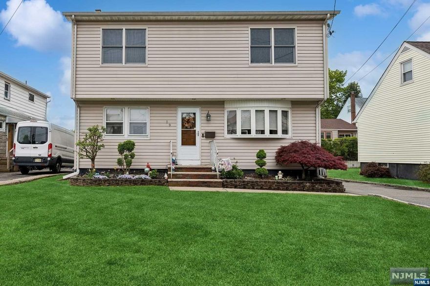 Welcome to this beautifully renovated 4-bedroom two bath home. Living room with fireplace, kitchen with center island and granite countertops. Bright and beautiful sunroom perfect for a breakfast nook. Formal dining room, bedroom and hall bath complete the first floor. Upstairs the primary bedroom has a large walk-in closet and double closet. Two bedrooms and a hall bath. The full basement has a recreation room and bar perfecting for entertaining. There is also a large laundry and utility area. Maintenance free Trex deck leads to the lush and private fenced in backyard. Quiet location convenient to shopping, restaurants and transportation to NYC.