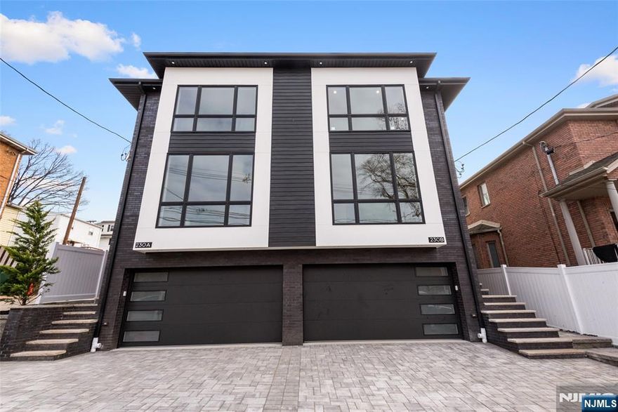 A premier investment opportunity awaits with this full 2-family side-by-side duplex at 230 8th St. Crafted by the renowned PBS Builders, Inc., this sprawling 6,200 total square foot property (3,100 square feet per side) offers a seamless blend of luxury and everyday functionality. Each of the two units features a mirrored, refined layout with 3 bedrooms and 3.5 bathrooms, designed for the quality-conscious buyer seeking a turnkey income-producing asset or a grand multi-generational residence. The main level of each unit boasts sun-drenched open-concept living spaces, formal dining rooms, and gourmet eat-in kitchens finished with premium materials and high-end appliances. Entertaining is effortless with expansive open floor plans that flow naturally. Rich hardwood flooring spans both levels, leading to second floors that each host a private primary suite and two additional well-appointed bedrooms. Both units include versatile ground floors with private entrances, full baths, and summer kitchens. This configuration is ideal for guest quarters, professional home offices, or extended family living. Perfectly situated just blocks from the vibrant Broad Avenue dining and shopping district, residents enjoy immediate access to premier restaurants and international markets. With effortless NYC transportation and proximity to top-rated Bergen County schools, this rare full-duplex offering represents the pinnacle of Palisades Park real estate.