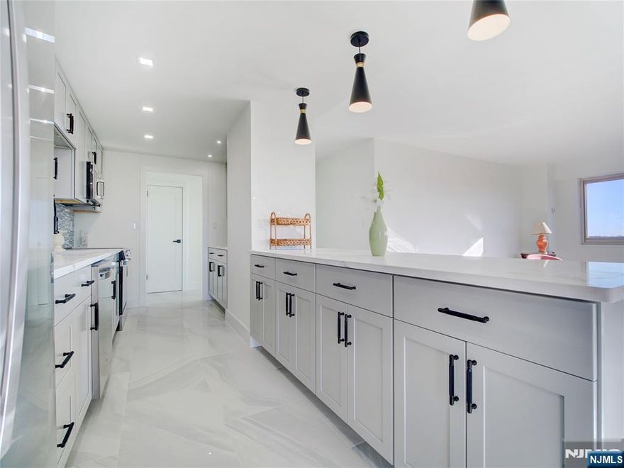 A rare, once-a-year opportunity at Harrison Park Towers. This just-completed, fully renovated three-bedroom, two-bath corner COOP offers a level of finish, size, and positioning rarely available in the building. Located on the 9th floor with southwest-facing views, this end unit is flooded with natural light and offers an exceptional sense of space and privacy.Residence 9L stands apart with its larger fp and thoughtful redesign. The brand-new kitchen showcases top-tier appliances, a unique built-in seating area, and an open-concept galley layout ideal for both everyday living and entertaining. The COOP also features 3 generously sized bedrooms, 2 sleek, newly finished bathrooms, and striking white marble flrs throughout, delivering a clean, modern, and cohesive aesthetic. HPT is a well-established, full-service coop offering a 24-hour concierge, all utilities included (electric, heat, hot water, and A/C), parking ($60/month, one space), comp jitney service to NYC trans and local shopping, a beautifully landscaped private garden, first-floor fitness center, and a bright, well-maintained laundry facility. Ideally located just mins from the GSP and Rt 280, this COOP represents outstanding value and convenience making it one of the most compelling offerings currently available in Essex County. Owner-occupancy required. Board app req.20% down payment a must. Shares: 440. Monthly maint: $2,121 incl taxes, building maint, and all utilities. Sq footage is approx.