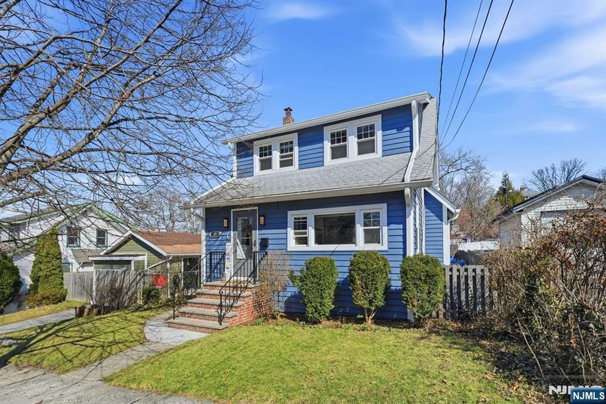 This beautifully updated and well-maintained 3-bedroom, 2-full bath Colonial offers a convenient location within walking distance to NYC transportation and close to major highways. The first floor features a welcoming entry foyer, living room, dining room, kitchen, and a full bath. Upstairs youâ€™ll find all three bedrooms along with the second full bathroom. The partially finished basement provides additional living space, perfect for a rec room or home office, and includes French drains and a sump pump with battery backup for added peace of mind. Additional highlights include radiant heating on the first and second floors, central air on the second floor with split units on the first floor, a whole-house water filter and water softener, alarm system, and an electric vehicle charging outlet. Outside, enjoy a nice backyard ideal for entertaining, along with a driveway that accommodates multiple vehicles and a detached one-car garage.