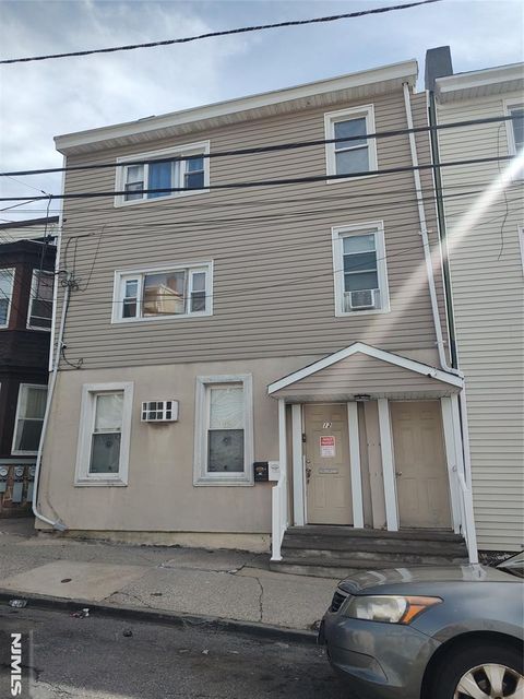 Photo of 12 Ward Street, Paterson, NJ 07501 (MLS # 26009489)