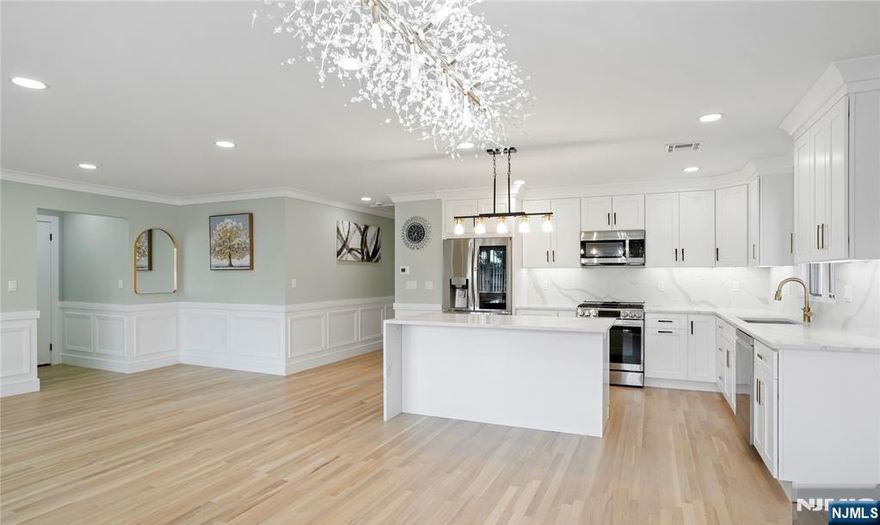 BRAND NEW CONSTRUCTION rental available in Wallington! This newly built 3-bedroom, 2-bath residence offers a modern layout with a primary suite featuring a private en-suite bath. The open-concept kitchen is equipped with a large waterfall island, dishwasher, hardwood floors, and central heating and cooling, making it ideal for both everyday living and entertaining. Washer and dryer hookups are available, with negotiable access on the first floor outside of the unit. Conveniently located at 243 Hayward Ave, the property offers easy access to Route 17, Route 3, and the Garden State Parkway, providing a smooth commute throughout Bergen County and into NYC. Nearby transportation options include NJ Transit bus service and close proximity to train stations in Wood-Ridge and Garfield, offering direct access to Manhattan. Enjoy nearby shopping, dining, parks, and local conveniences, all within minutes. 12-month lease. Broker fee applies. Tenant screening requirements apply.