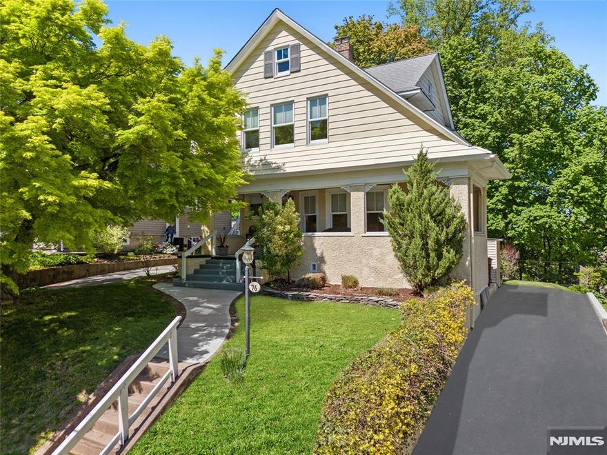 Located in Nutley's sought after Yantacaw School section, this charming two bedroom home offers the perfect blend of location, layout, and lifestyle. Just moments from downtown restaurants, parks, NYC transportation, and highly ranked Elementary School. Set against the rear of Nichols Park, the property enjoys a private, tree lined backdrop with beautiful seasonal views. The main level features a bright, open concept layout highlighted by a sun filled dining area surrounded by windows and direct access to the deck. The updated kitchen offers a center island, modern finishes, and seamless flow into the dining space, ideal for both everyday living and entertaining. A comfortable living room completes the first floor. Upstairs includes two well sized bedrooms and a full bathroom featuring a soaking tub and glass-enclosed shower. The finished basement adds valuable bonus space with a recreation area, office, and half bath, offering flexibility for a variety of needs. The backyard includes both deck and grass areas, perfect for relaxing or entertaining while enjoying the unique natural setting. A covered front porch adds to the home's inviting curb appeal. Here is your opportunity to own a home with character, updates, and a rare backyard setting.