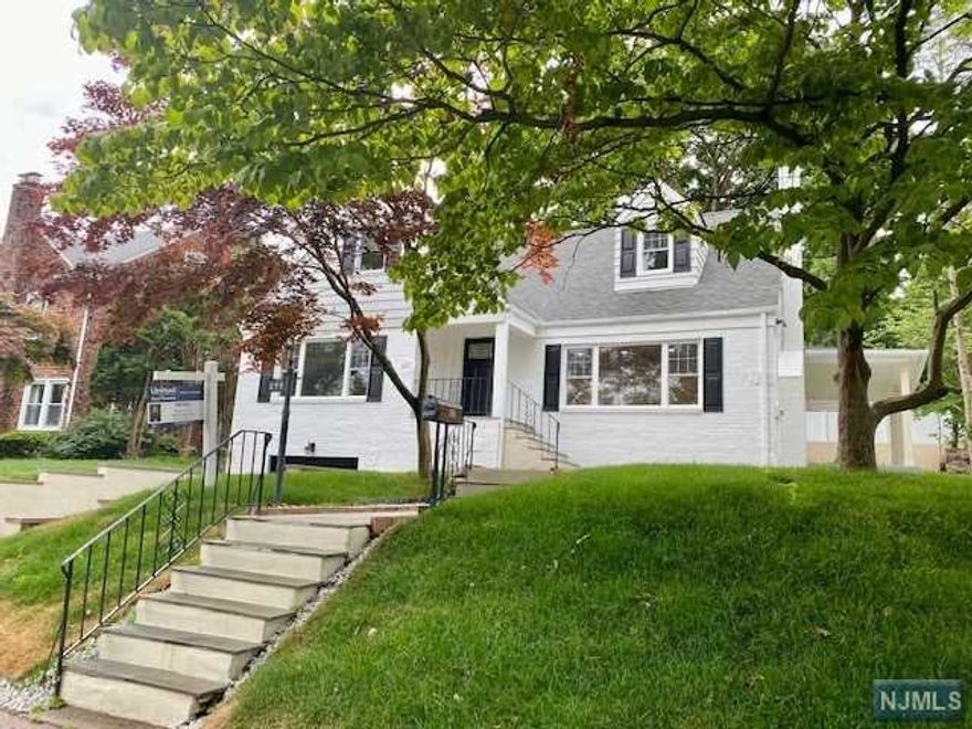 Welcome to this 2,000+ SF. 5 bedrooms, 2 full baths, and a bonus office. This beautiful renovated top to bottom HOME in the heart of Hawthorne and a block away from the beautiful park in town. The home has central air, forced heat, hardwood floors, and top of the line finishes throughout! This brick Cape Cod features a massive kitchen with quartz counter tops, breakfast bar, soft close cabinets, Samsung stainless steel appliances, and much more. The kitchen is open up to a big formal dining area which leads to a living room that features a fireplace. Also on the first floor is 2 bedrooms, a full bathroom. Second floor features 3 bedrooms, full bathroom and office. Basement is fully finished. The house has also a 1 car garage and a 2 car driveway.