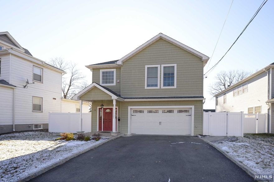 BEAUTIFUL YOUNG COLONIAL IN THE HEART OF BERGENFIELD! FIRST FLOOR FEATURES OPEN FLOOR PLAN... LARGE LIVING ROOM WITH WOOD BURNING FIREPLACE,HALF BATH, KITCHEN WITH DOUBLE TIER ISLAND, GRANITE COUNTERTOPS, STAINLESS STEEL APPLIANCES, TILED BACKSPLASH AND LARGE DINING ROOM COMBO. SECOND FLOOR WELCOMES YOU TO A LARGE MASTER SUITE WITH BEAUTIFUL WINDOWS AND NATURAL LIGHT, BUILT OUT WALK IN CLOSET,MASTER BATH COMPLETE WITH JACUZZI TUB AND SEPARATE OVERSIZED SHOWER WITH GRANITE SHELVING, 3 ADDITIONAL GENEROUS SIZED BEDROOMS, LAUNDRY ROOM, FULL BATH. HOME ALSO INCLUDES A OVERSIZED TWO CAR GARAGE AND SOLAR PANLES ON THE ROOF! MOVE RIGHT IN AND ENJOY ALL THE BENEFITS OF GREEN LIVING! HOME STILL HAS 5.5 YEARS LEFT ON NEW CONSTRUCTION WARRANTY.