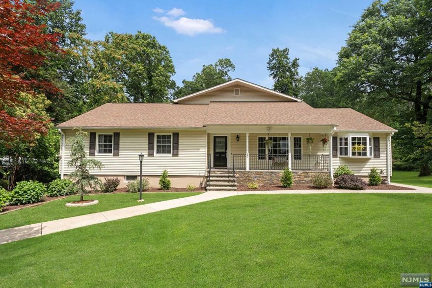 Welcome to your dream home! This custom-built four bedroom, four bathroom colonial is a true gem! The house boasts a charming and picturesque porch where you can sit back, unwind and enjoy the tranquility of the surrounding landscape. Inside you'll discover an inviting eat-in kitchen that is perfect for entertaining and gatherings. The large deck and backyard provide an ideal outdoor space for relaxation and barbecues. Prepare to be impressed by the fully finished walk-out basement which adds valuable additional living area, perfect for a home theater, game room or guest suite. With its thoughtful design, this home is a great blend of comfort and style. The spacious bedrooms offer ample closet space, while the bathrooms are designed to provide a spa-like experience. Whether you are seeking a cozy evening indoors or a place to host this home has it all. Don't miss the opportunity to make this beautiful colonial your forever home with amazing neighborhood with tons of amenities.