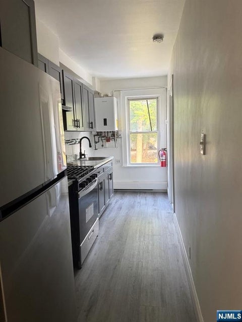 Photo of 21 Mattlage PL #21B, Englewood, NJ 07631 (MLS # 26037783)