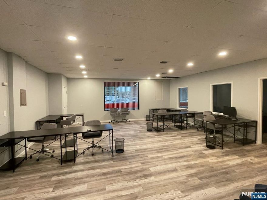 Excellent large office space, approximately 2,000 square feet, in prime location of bustling redevelopment zone of Main Street in Hackensack! Very large windows ideal for bringing in foot traffic. Large open main area with conference room set up plus two private office rooms and a kitchenette. Includes two parking spots plus, the municipal parking is located behind the building for patrons or employees. Minimum 3 year lease required. Flexible terms. Fantastic opportunity for many different types of office set ups and at a great value. Don't miss this!