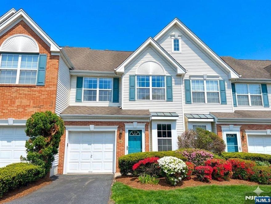 Sparkling Buckingham model townhome located in the highly desirable Cambridge Heights gated community in Nutley! This beautifully maintained home features a spacious living room, formal dining area, and a newly renovated modern kitchen with a stunning center island. Sliders from the kitchen lead to a private patio and open shared backyard, perfect for relaxing or entertaining. The bright upper level offers newer hardwood floors, a dedicated office room, and two spacious bedrooms, including a primary suite with walk-in closet and private bath. A second full bath, laundry room, and generous closet space throughout add convenience and functionality. Enjoy resort-style amenities including an inground heated pool, fitness center with sauna, tennis courts, playground, jogging/biking paths, and clubhouse. NYC direct bus at the community gate makes commuting easy. Quiet cul-de-sac location with plenty of guest parking. A wonderful place to call home!