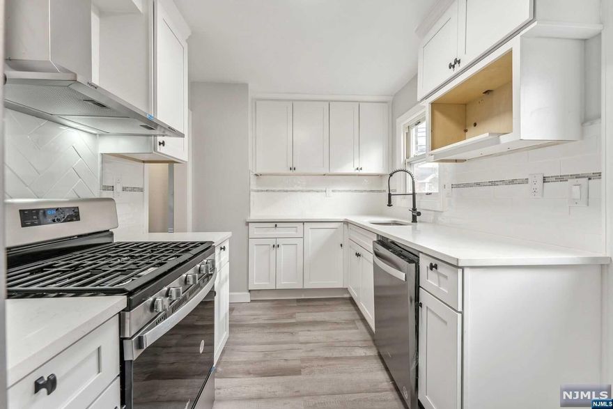 Welcome to this completely renovated four bedroom two full bath colonial. This beautiful homes features two bedrooms on the first floor, new kitchen, new full bath, refinished hardwood floors with high ceilings. The second floor has two good size bedrooms with an additional office/playroom or use as a guestroom. Brand new furnace and air conditioning. Come see what the town of Rutherford has to offer...great shops, resturants, and easy commute to NYC with train station, close to major highways. Please take a look at the virtual tour and make an appointment today! Call Darlene at 201-280-1836 to make an appoitment to see this home Saturday or Sunday December 11th & 12Th.