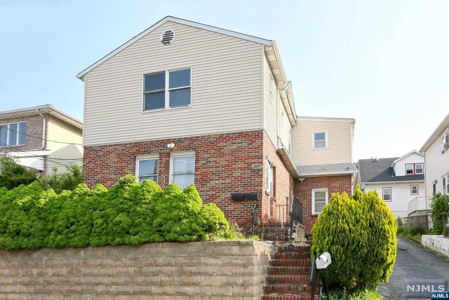 GREAT INVESTMENT OPPORTUNITY OR LIVE IN ONE FLOOR AND RENT THE OTHER. THIS 50X100 PROPERTY OFFERS 1ST FLOOR WITH 3 BEDROOMS, LIVING ROOM, KITCHEN, 2 FULL BATHROOMS AND EXTRA ROOM CAN BE USED AS 4TH BEDROOM/OFFICE/DEN/PLAYROOM. 2ND FLOOR OFFERS 3 BEDROOMS, LIVING ROOM, KITCHEN, 2 FULL BATHROOMS.BASEMENT WITH LOTS OF STORAGE, LAUNDRY AND AN EXTRA ROOM. SEPARATE LAUNDRY FOR EACH UNIT.2 CAR GARAGE MULTIPLE CARS IN DRIVE-WAY. CLOSE TO NYC TRANSPORTATION, MAIN ROUTES 46,80,4 95,MINUTES AWAY FROM GWB.BEING SOLD AS IS INSPECTIONS FOR INFORMATIONAL PURPOSE ONLY.