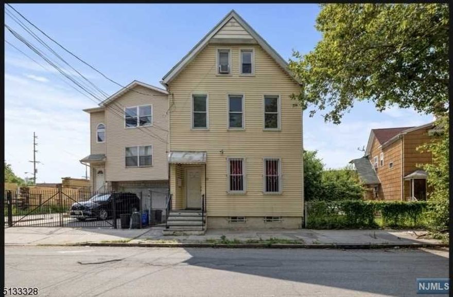 Excellent opportunity to own and invest in a large two- family home, property recently renovated in The Ironbound neighborhood in the city of Newark, Property conveniently located for commuters, bus & train just 30 minutes from NYC. First floor has 3 bedrooms and 2 full baths, Second floor has 4 bedrooms and 1 bath, each has they own laundry and Central Air. Plus, finished basement. It is incredibly spacious and great investment opportunity.