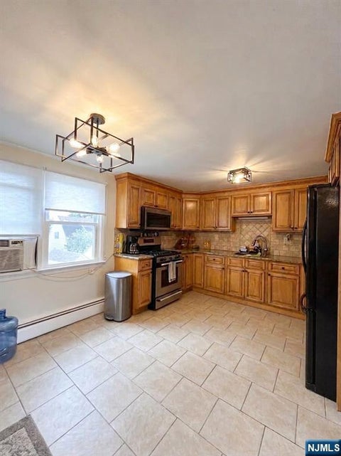 Photo of 158 Schley ST #2, Garfield, NJ 07026 (MLS # 26034423)