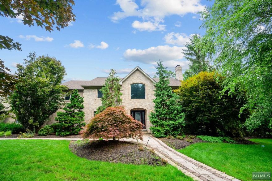 This masterpiece is a spectacle to admire: almost an acre of beautiful grounds invite a life outdoors, and elegant interiors create ease and sophistication. With five bedrooms, five bathrooms, a guest house, and finished basement with 8" ceilings, enjoy the space to create the life of your dreams in an ideal location. This home features everything you can ask for including but not limited to in ground pool and spa, cabana with full bathroom and kitchenette, outdoor shower, bar, outdoor kitchen with brick pizza oven, sauna, gym and movie theater. Great town with blue ribbon schools only 25min away from NYC. Do not wait come and see for yourself.