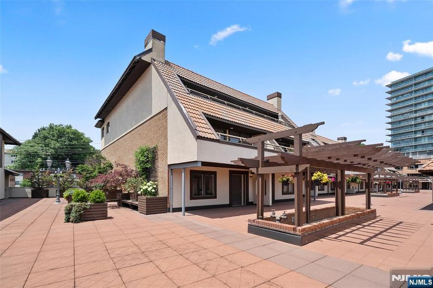 ***Contact Yuliya at 201-341-7777 to see it today!*** 'CLIFF HOUSE' Mediterranean villa inspired intimate townhome community on the Hudson River Palisades welcomes you! East-facing 3 BD 2.5 BTHS generously sized three-level townhome boasting 2,325-SF and a private attached oversized 2-car garage. Huge kitchen, spacious dining room and living room anchored by a wood-burning fireplace. Sliding door leading to a large terrace where you can enjoy the sunrise! Bedrooms are conveniently located on a separate floor. Hardwood floors and lots of closets throughout. Windows facing both East and West provide lots of natural light all day. Ideally located community offers 24-hour guard attended gatehouse, lovely promenade, resident gym with sauna and a spectacular outdoor pool overlooking Hudson River and NYC. Bus stop is located in front of the complex, easy access to Manhattan. Presented by The CHEN AGENCY, YULIYA SHINKORENKO at 201-341-7777 or Yuliya@ChenAgency.com