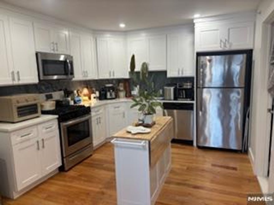 New construction apartments featuring an open concept living room, kitchen, full bathroom, washer and dryer in unit and parking space! Hardwood floors throughout, split heating and cooling system, intercom system, exercise room, conference room, storage and elevator.