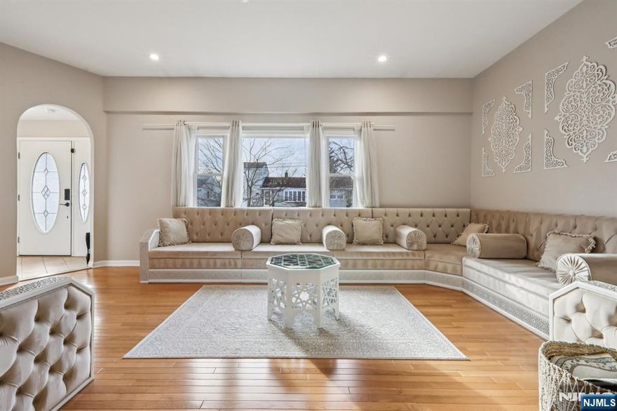 Offering approximately 3,500 square feet of refined living space, this residence is designed with exceptional versatilityâ€”ideal for extended or multi-generational living. 1st Floor: High ceilings, expansive living and dining areas with custom furnishings, and a beautifully finished kitchen with direct access to the backyard and in-ground pool. Includes a primary suite with multi-jet shower, jacuzzi, double vanity, and a second bedroom with en-suite powder roomâ€”well-suited for guests or extended family. 2nd Floor: Functions as a fully independent living level with its own full kitchen, spacious living and dining areas, a primary suite with full bath, three additional bedrooms, and a large dedicated office. Lower Level: Finished bonus space with den, recreational area, kitchenette, and full bath, plus separate laundry and ample unfinished storage.
