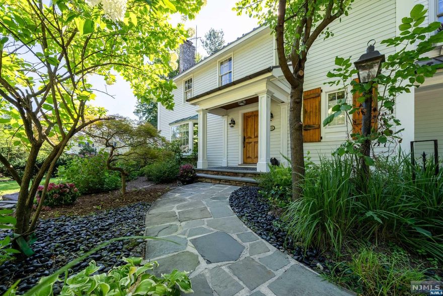 Embrace the serenity of this New England-Style Farmhouse Colonial in Upper Montclair. With 3,400 sq ft of refined space, this 6-bedroom, 4.5-bathroom home blends classic elegance with modern touches. Enjoy the winding stone path, 400 sq ft bluestone patio, red and white oak flooring, and sophisticated millwork. The airy great room, gourmet eat-in kitchen with top-tier appliances, and expansive dining room offer luxury living. The main floor hosts an office suite, children's playroom, closed in porch and more, while the upper levels house bedrooms and bathrooms, including a primary suite with jacuzzi, sitting room and fireplace. The nearly acre exterior features three decks, two stone patios, a heated pool, basketball court, and ample parking. Seize the opportunity to own this stunning property in one of Montclair's premier treelined neighborhood, with Yantacaw Park's tranquility at your doorstep, minutes from Tuers and Brookdale Park, boutique shopping, dining, and NJ Transit.