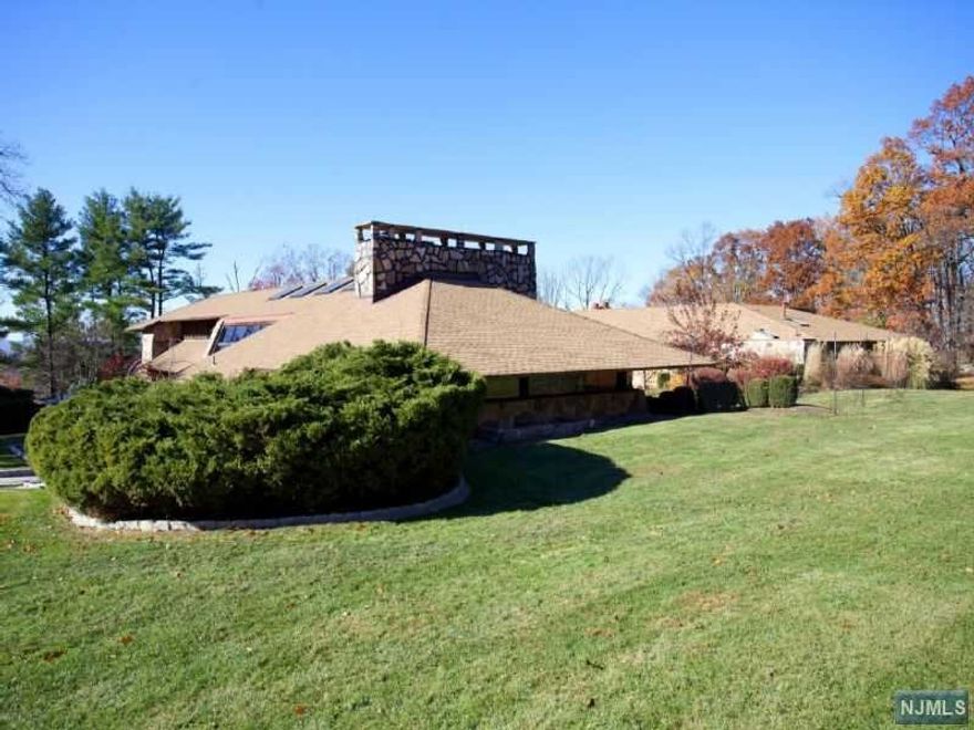 THE MOST EXTRAORDINARY 4.013 ACRE COMPOUND IS AVAILABLE FOR THE BUYER WHO WILL SETTLE FOR NOTHING LESS THAN THE BEST, HIGHEST ALPINE ELEVATION, ON RELATIVELY FLAT CUL-DE-SAC LAND WITH PANORAMIC WESTERN AND SOUTHERN VIEWS BORDERING DEED RESTRICTED LAND. Currently, a large Norman Jaffe designed post modern home sits on the four acre Northern portion of land. SUNSET WESTERN VIEWS CAN BE ENJOYED FROM PORTIONS OF THE PROPERTY, AND ON THE SOUTHERN LOT, NYC VIEWS CAN BE SEEN AT NIGHT! NOTHING HIGHER IN ALPINE, NOTHING BETTER!