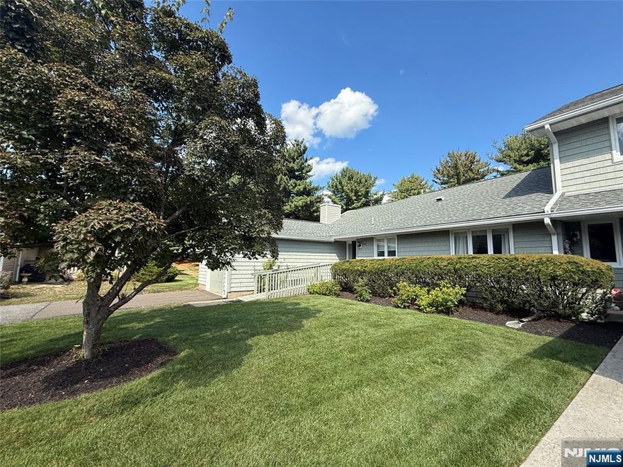 RARE end unit in Ramapo Ridge on Sunset! Vaulted Ceilings, Large side/back yard, large rooms, 1st floor living, master suite, updated unit, new deck, and walking distance to the pool and tennis courts!