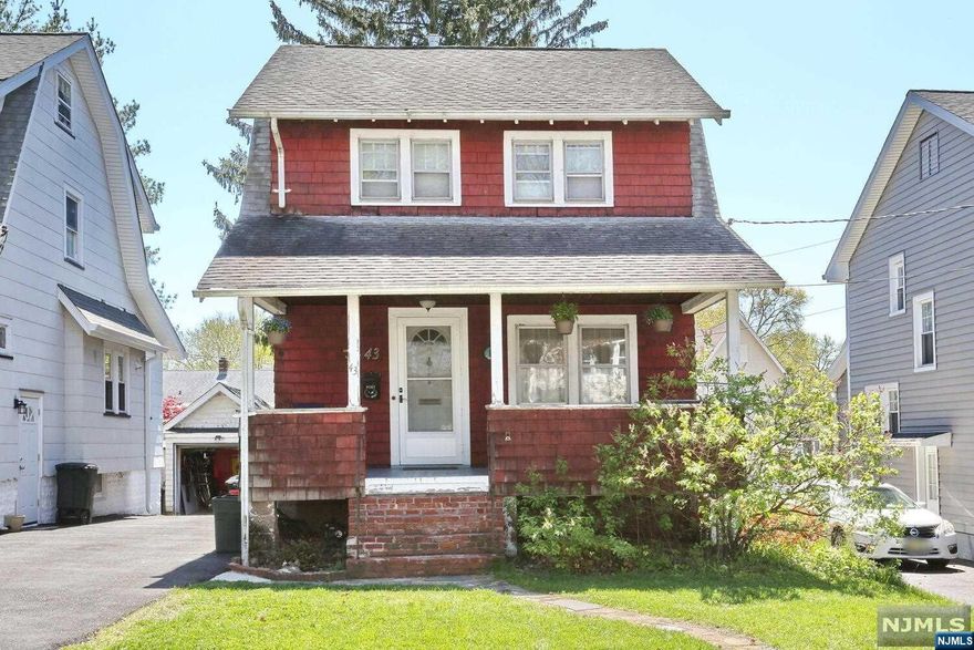 Colonial style home with Lemonade front porch on quiet tree lined street! Living room, formal dining room, kitchen w/pantry/breakfast nook, den or office could be 3rd bedroom. Upstairs two good size bedrooms and updated bath. Large walk up attic! Basement is full and unfinished. Newer gas heat. No FHA or VA as siding needs updating and garage needs work. Close to school, town and NY transportation. Shared driveway