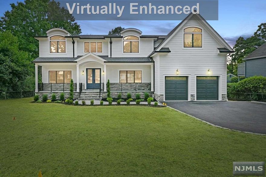 Just completed Colonial w eye-catching curb appeal on rare 27,000sq ft property! Blt w/ qual craftsmanship & entertaining in mind. Unique features: lemonade porch, covered bluestone patio w/ FP, plus lg deck, HUGE private yard, walk-out basement, 10ft ceilings, pantry & mud rms, generator panel. A 2-stry foyer flanked by FLR & open FDR leads to chef's kitchen w/ Thermador smart appliances, custom cabs, & enormous quartz ctr island. Spacious great room w/ gas FP, coffered ceiling, beverage bar w/ wine fridge & nearby PR. 2nd fl: Prime Suite w/ private balcony, ambient lighting, dual lge w/i closets & luxurious FB w/ soaking tub; Jr Suite w/ lge. w/i closet & stylish FB. 2 more lge BRs with dual closets; stylish roomy FB, lg laundry rm. Ground level basement w/ BR, FB w/shower, & space for office, game/media room, bar, & gym. Grnd level walkout to covered patio, DEEP flat yard that fits pool or whatever you desire! Low taxes, great schools, convenient location!