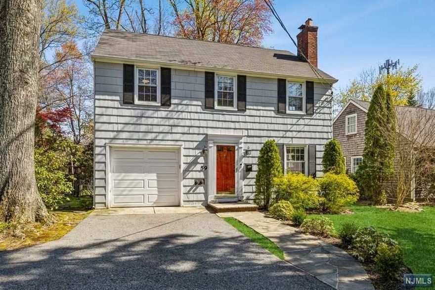 Lovely Upper Montclair side-hall colonial with 3 spacious bedrooms & 1.5 bathrooms. Enjoy the warm weather on the back deck, patio and large backyard. Or, cozy up to the wood-burning fireplace when it's cold out. Features include new stainless steel appliances, central AC, a finished basement and a rare Montclair attached garage, plus a 3 car driveway. Just steps from MSU, NYC train, Presby Iris Gardens and Mills Reservation. Close to Rt 3 & 46 shopping. Fantastic location for commuters!