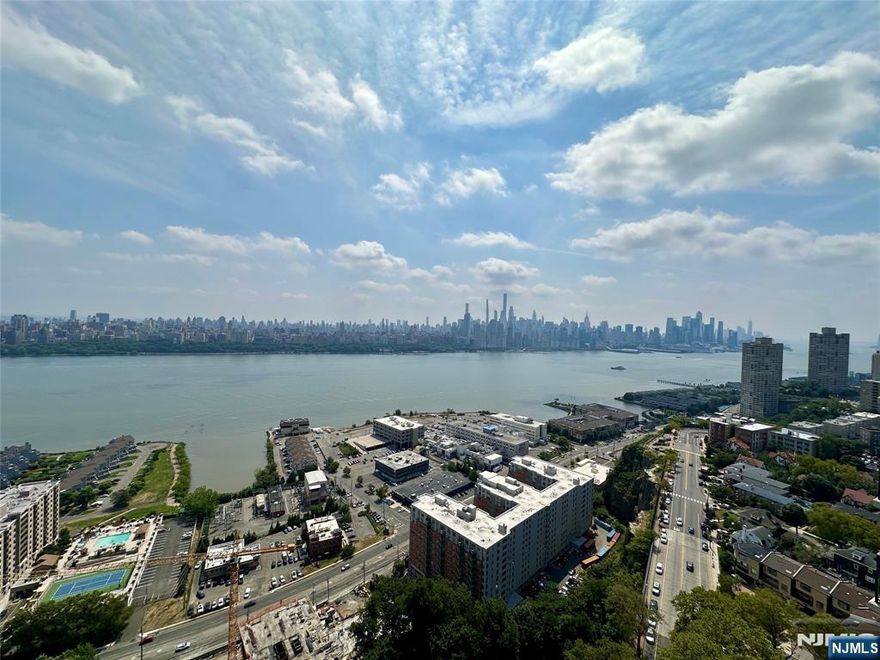 TOP FLOOR Furnished one bedroom at the Parker Imperial with direct east, north & south wide open views of Manhattan and the Hudson River! Open layout with lots of natural sunlight, new flooring throughout, a huge living/dining room, spacious kitchen with SS appliances, massive bedroom with large walk-in closet, renovated bathroom, tons of closet space and your own balcony! One indoor parking space, amenities and water is included in the rent. New dishwasher and toilet were just installed. The Parker Imperial offers a 24 hour doorman, elevator, outdoor pool, on-site fitness center with saunas, laundry on every floor and indoor parking. The building sits next to James J. Braddock Park which offers, tennis courts, baseball & soccer fields, playgrounds, workout areas and much more. NJ Transit bus stop in front of the building offering an easy commute to NYC, multiple restaurants and shops in the immediate area.