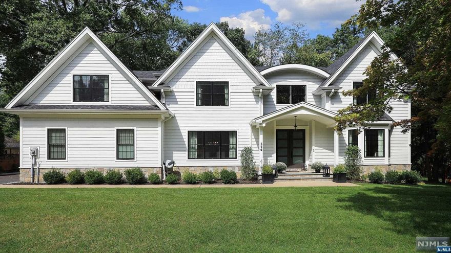 Welcome home to this 2020 new construction modern luxury home. Featuring over 6000 sq ft set on a quiet street with a flat level, fenced in yard. Make a grand entrance through the two story foyer with sweeping staircase. High ceilings and open floor plan invite you to the bright living room with fireplace and formal dining room. This state of the art Chef's kitchen with Wolf and Sub Zero appliances overlooks the pristine backyard. The kitchen highlights are a large center island, beautiful butlers pantry, walk in pantry and eat in kitchen area. Open to the large family room make it perfect for entertaining. The mudroom leads to the 3 car garage with EV charger and exit to rear yard. Retreat to a sublime primary suite, gas fireplace, private office space, custom walk in closet and spa like primary bath with a soaking tub and private water closet, double sinks and luxurious shower. Second floor has 3 additional ensuites and laundry. The lower level is recreation dream.