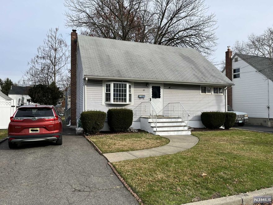 This charming cape, located in a desirable neighborhood in NJ, provides an amazing opportunity to own your potential dream home with just a few finishing touches. This spacious 4 bedroom home touts an intuitive layout that makes it feel much larger than your typical cape. Large living spaces that naturally flow together make this house PERFECT for hosting events. The beautiful family room in the back of the house, with a wood burning fireplace, overlooks wooden deck and good sized backyard. The first floor bathroom was recently updated to a more modern look and feel. Privacy is a HUGE benefit with this house being located on a "dead-end" street! Unfinished basement with good ceiling height and space has great potential for finishing. Located in the desirable "Yantacaw" school district this property is also within walking distance to NYC public transportation & ON3 campus.