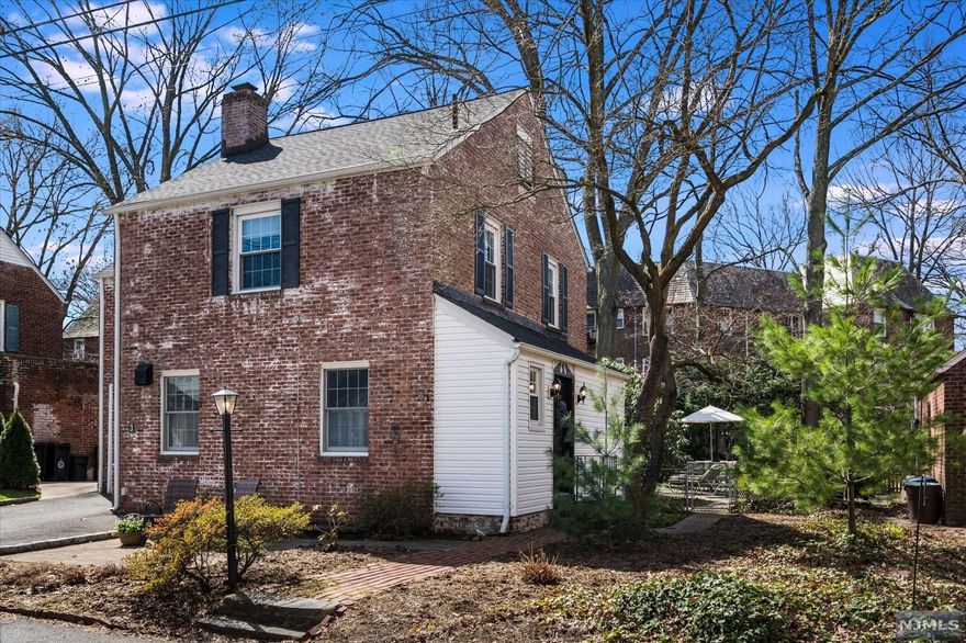 Move right in to this beautiful Radburn colonial.This elegant home welcomes you w/a lovely EF.The updated EIK boasts white cabinetry & granite counters,& the FDR opens to the LR w/charming built-ins.Continue on to the FR w/vaulted ceiling & stunning exposed brick wall & a delightful sunrm overlooking the manicured yard.A perfectly placed PR completes the 1st level.Upstairs are 3 large BRs,all w/ample closet space,& an updated full bth.The attic offers enormous storage,& multiple cedar closets!The lower level w/terrific rec rm will fill so many needs,plus even more storage!C/A,interior access to the gar,newer roof & furnace-too many updates to list!This storybook home is in a commuter's dream location.Enjoy the benefits of belonging to Radburn Assoc. w/use of pools,tennis,community center,programs for all ages incl camp,along w/private walking paths thru the parks.