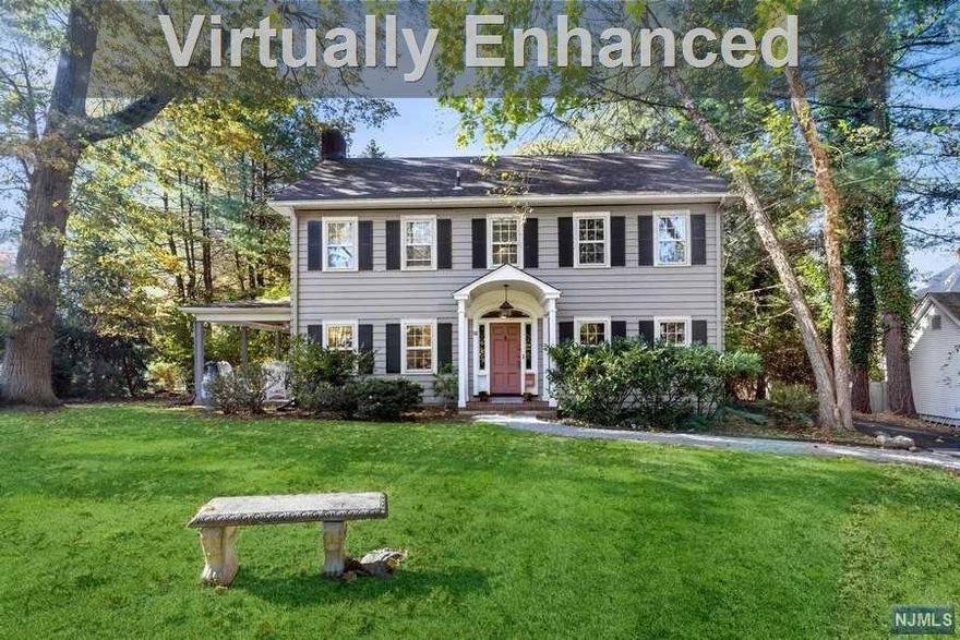 Classic 5 BR, 2.5 Bath Center Hall Colonial on one of Harrington Park's most charming and sought after streets. This warm, inviting and sun-filled home is beautifully situated on a quiet tree lined street yet a short stroll to HP's PreK-8 school, library, downtown and NYC transportation. 1st floor: spacious entry foyer w/closet; living room w/fpl and French doors to side porch; dining room; Large kitchen w/pantry, SS appliances, breakfast bar, separate dining area and door to backyard; cozy family room with beautiful picture window; powder room and laundry. 2nd Fl: Stunning primary suite w/dressing room and bath. 3 add'l BR and a full bath. 3rd Floor; BR #5, office with skylight; wall of closets; 3rd fl. has electric heat. Lower Level offers a recreation room, office & utility/storage. Central air, irrigation system, new furnace, neutral decor, wood floors and more. Come visit!