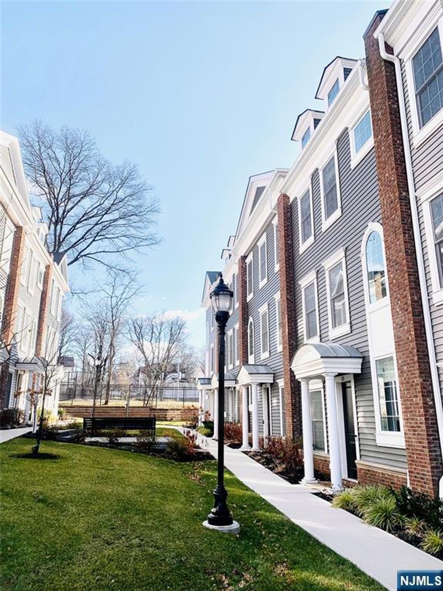 Immaculate and modern 2024 Townhouse, practically new. Open Floor Plan with hardwood floors throughout on the 1st floor living area with Very Spacious Living Room w/Gas Fireplace, Modern Eat-in-Kitchen with quartz counter tops and high-end appliances, spacious Formal Dining Room, Huge Balcony off LR for Relaxation and Entertaining, Powder Room, and 9' Ceilings. Front and Rear Entrances on Ground Level with Bonus Room, Full Bath, two-car Garage and driveway for two cars tandem. Primary Suite w/Full Bath, two additional spacious bedroom and hall Full Bath (SOT). Laundry in unit with high-end washer and dryer. Plenty of Closet Space throughout. Pets conditional: cats, small dogs; additional monthly fee may apply.