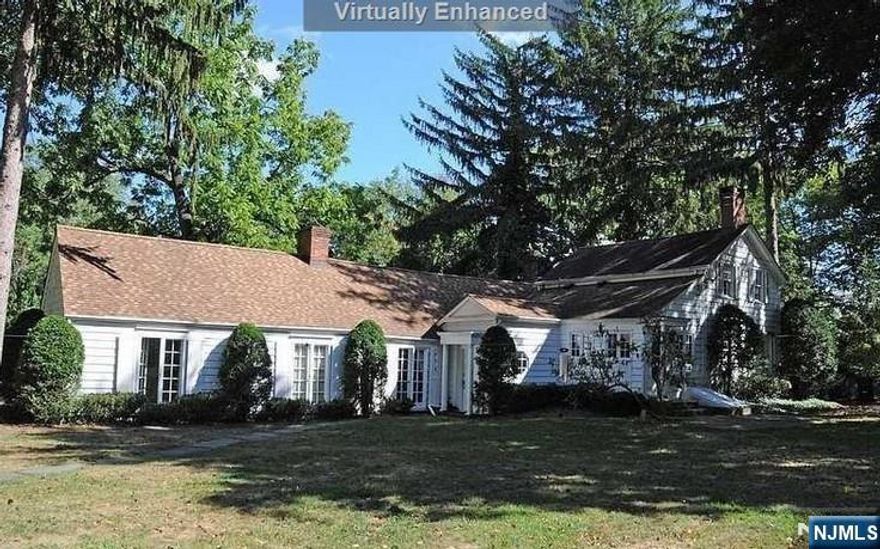 UPDATE: We have architects renderings and plans for a newly proposed 8,500 SF home with a 4 car garage attached to a portion of the original Carlock historic structure. The plans are provided for informational purposes only. While the proposed plans have been preliminarily received well by the borough in concept, no formal approvals have been applied for or obtained. Don't miss this opportunity! REVISED PRICING! Amazing opportunity to restore existing "J.J. Carlock House" historic registered home. This private 2.5 acre lot is on the corner of Chestnut Ridge Rd and Mill Rd and features the historic home and separate carriage house. There is also a tennis court and large in ground pool. All structures in need of renovation and repair. Excellent location close to highways and shopping, surrounded by large new construction homes.