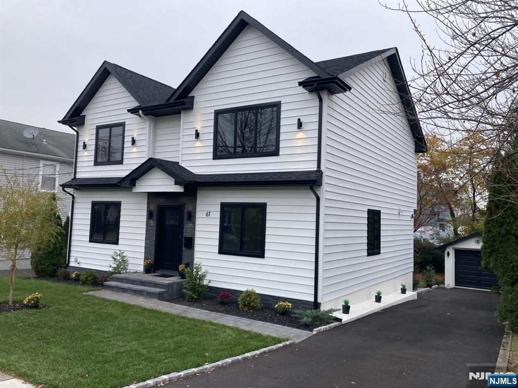 Photo of 61 Pomona Avenue, Fair Lawn, NJ 07410 (MLS # 25041204)