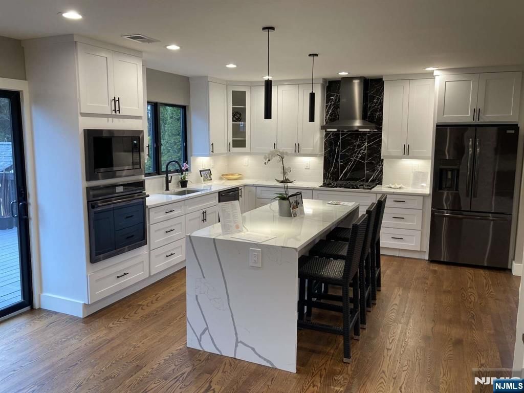 Photo of 61 Pomona Avenue, Fair Lawn, NJ 07410 (MLS # 25041204)