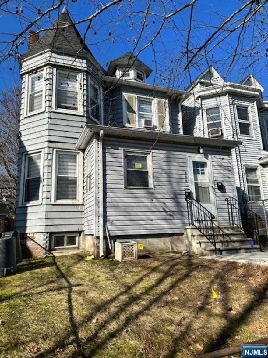 Back on Market! 2 family home with 2 bedrooms in each unit, fully finished attic and fully finished basement with additional bathroom. No Parking.