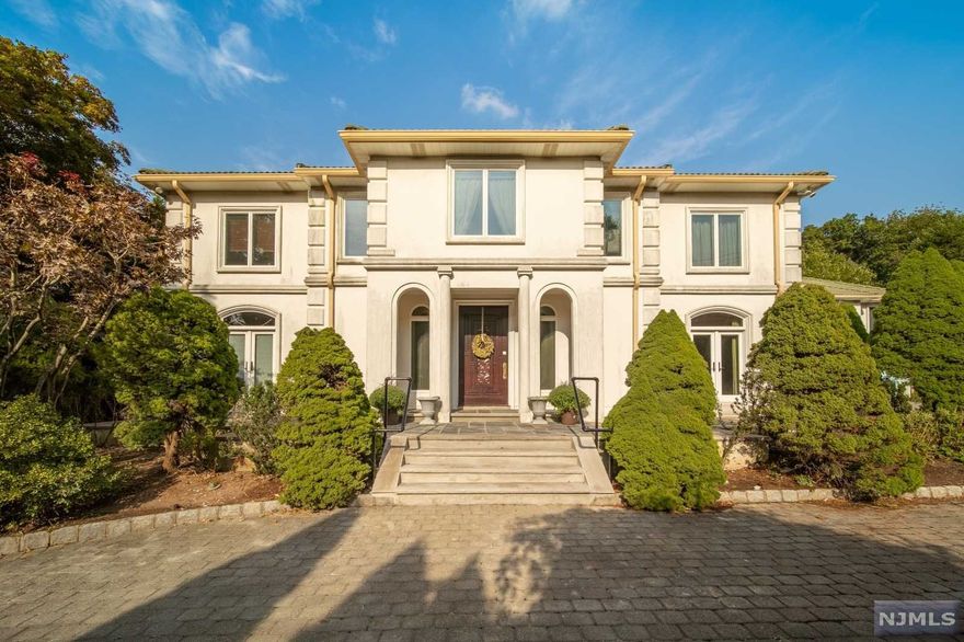 EXCEPTIONAL COLONIAL ON DESIRABLE EAST OF CLOSTER. THIS GATED ESTATE ON A RARELY AVAILABLE PEACEFUL AND LEVELED 0.66 ACRE LOT AND INGROUND SWIMMING POOL IS FOR DISCERNING BUYERS. 5,729 SQFT INTERIOR OFFERS MASTER SUITE ON THE FIRST FLOOR, 2 STORY AWESOME GREAT ROOM W/ FPL, TALL WINDOWS, DEN/LIBRARY, HUGE FORMAL DINING ROOM, MODERN EAT-IN KITCHEN W/ RADIANT HEAT FLOOR. CHARMING BREEZEWAY WITH FRENCH DOOR AND WINDOW WALL SITUATED IN BETWEEN 3 CAR ATTACHED GARAGE. 2 ND FLOOR OFFERS ALL VERY GENEROUS 4 BEDROOMS AND 2 FULL BATH AND A DEN/MEDIA ROOM, LAUNDRY ROOM. SEPARATELY LOCATED ENORMOUS SIZE SUITE ABOVE GARAGE IS IDEAL FOR GUEST APT OR HOME OFFICE OR EXCERSIZE ROOM. THE CONVENIENT LOCATION FOR SCHOOL, SHOPPING AND EASY ACCESS TO PALISADES PKYWY. PROXIMITY TO NYC.