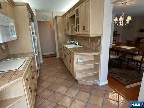 Photo of 300 Winston Drive #302, Cliffside Park, NJ 07010 (MLS # 26024507)