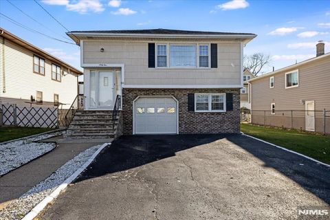 Photo of 64 Gilbert Ave, Elmwood Park, NJ 07407 (MLS # 25042313)