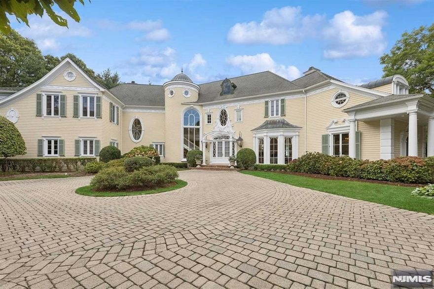 A Custom-built Colonial style estate situated at the end of a gorgeous tree lined Cul de Sac.This spectacular, one-of-a-kind extraordinary home is a masterpiece of luxury and craftsmanship, brimming with exquisite details that showcase unparalleled elegance. The intricate moldings and finishings throughout the home are a testament to the meticulous attention to detail that went into its design.A grand curved staircase greets you in the foyer, setting the tone for the opulence found in every corner.The elegantly appointed library drenched in natural light from 9ft French doors,offers a serene space for reading or contemplation.The GRT RM is a breathtaking centerpiece, featuring 3 sets of floor-to-ceiling doors opening to the rear brick patio & outdoor oasis.Enchanting primary suite + 4 bedrooms & 2 additional.FBTHS Finished LL w/custom wine cellar,billiard Rm,gym,FBTH + media rm. Lush landscaping, pool,elegant pool house w/FBTH,2 Koi ponds surrounded by English style perennial gardens.