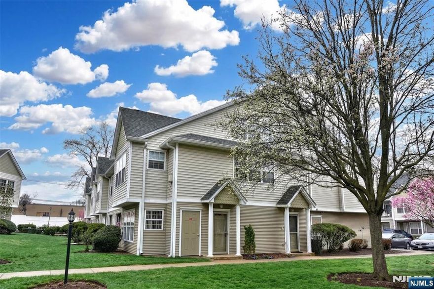 Desirable ranch-style condo in Allwood Mews offering easy effortless one-floor living in Clifton NJ less than 20 miles outside NY City. This Devon Model end-unit features a spacious, open floor plan with laminate flooring and abundant closet space. The kitchen includes a wide breakfast bar open to the living and dining areas, ideal for everyday living and entertaining. A flexible area off the living room is perfect for a den or home office. Enjoy a wide private patio with access to green space from both the living room and primary bedroom. Attached garage plus driveway and guest parking. Add the peace of mind from updated central air, furnace and hot water heater. Set within a quiet, well-maintained community, yet just minutes from shopping, dining, and direct transportation options to NY City, this home offers the perfect balance of suburban comfort and commuter convenience. This is the one buyers wait forâ€”rare end-unit, ranch-style living with light filled space, privacy, and location all in one.