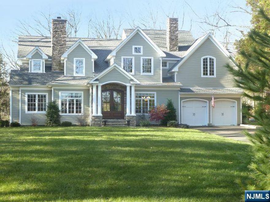 Serene country setting surrounded by multi-million $ homes showcases this young country colonial built in 2000's over pre existing foundation. High ceilings, elegant trim, hardwood floors, an open floorplan and finished lower level. Alarm system, security cameras, natural gas generator, central vac, radiant and baseboard heat.