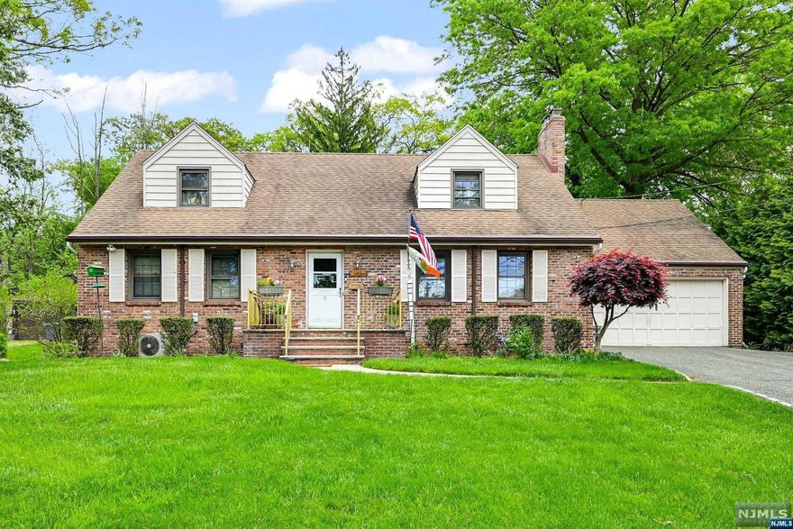 Expanded cape (approx.2,700sf) with large rooms throughout set on a quiet street with endless possibilities! Entry foyer welcomes you into the bright living room with corner fireplace, formal dining room, eat-in kitchen, family room, first floor bedroom, and bath. There is a three- season room off the kitchen and a Bonus room with full bath above the garage-perfect for home office, gym, guest suite. Upstairs there is a very large primary bedroom, two additional bedrooms and a bath. There is a huge basement with a bar and second fireplace. Conveniently located close to stores, restaurants, parks & schools! Great opportunity.